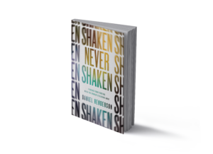 Book standing on end titled Never Shaken