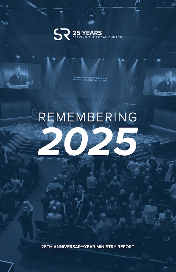 Shane and Shane leading worship for a room full of people