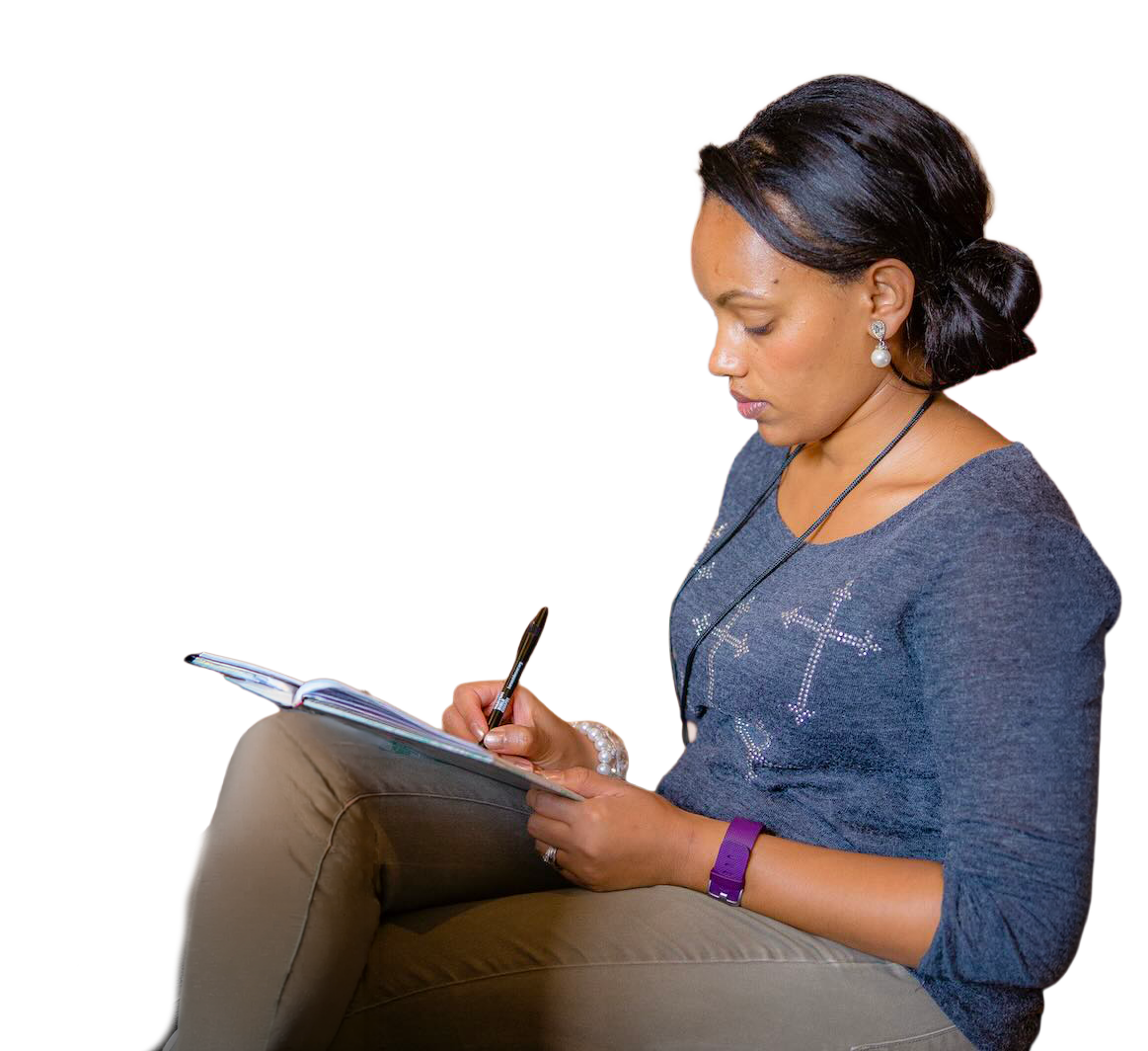 woman taking notes
